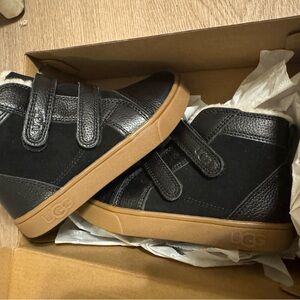 UGG Black and Tan Sneakers Sleek Design
